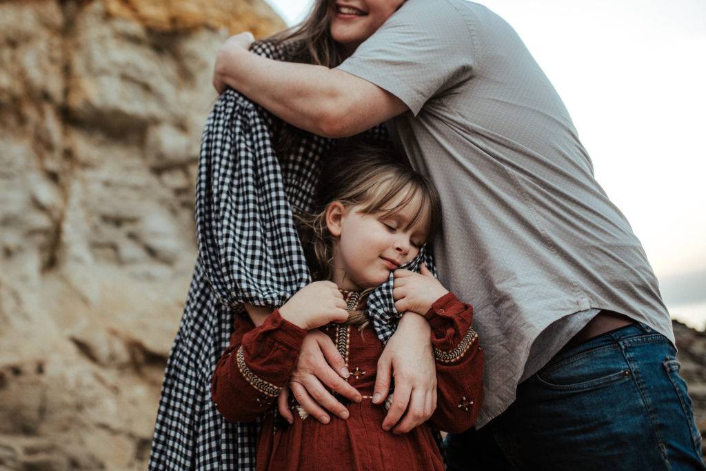 melbourne family photography, a girl holds her mothers hands