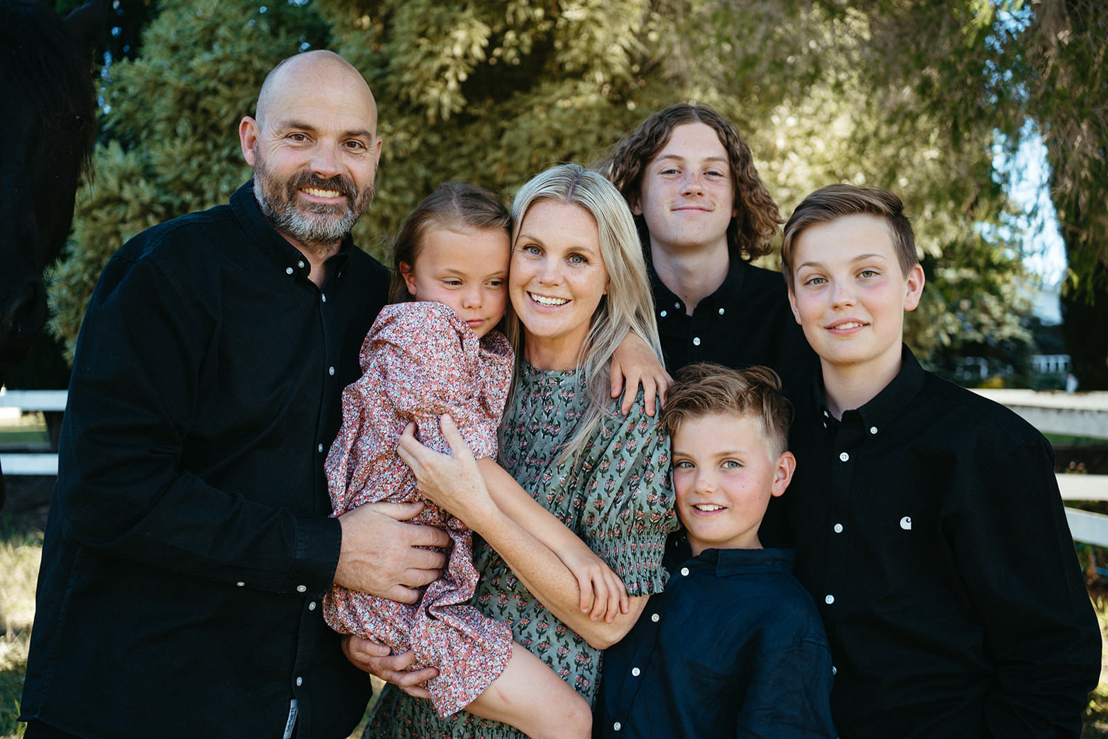 a Healesville family of six looking at the camera