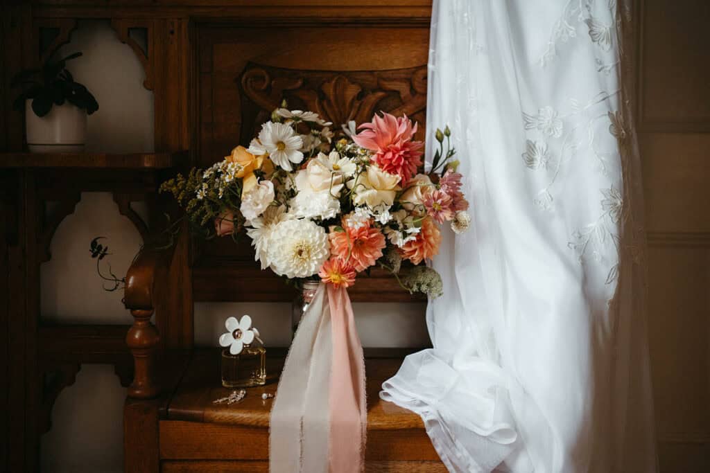 wedding flowers oranges and creams