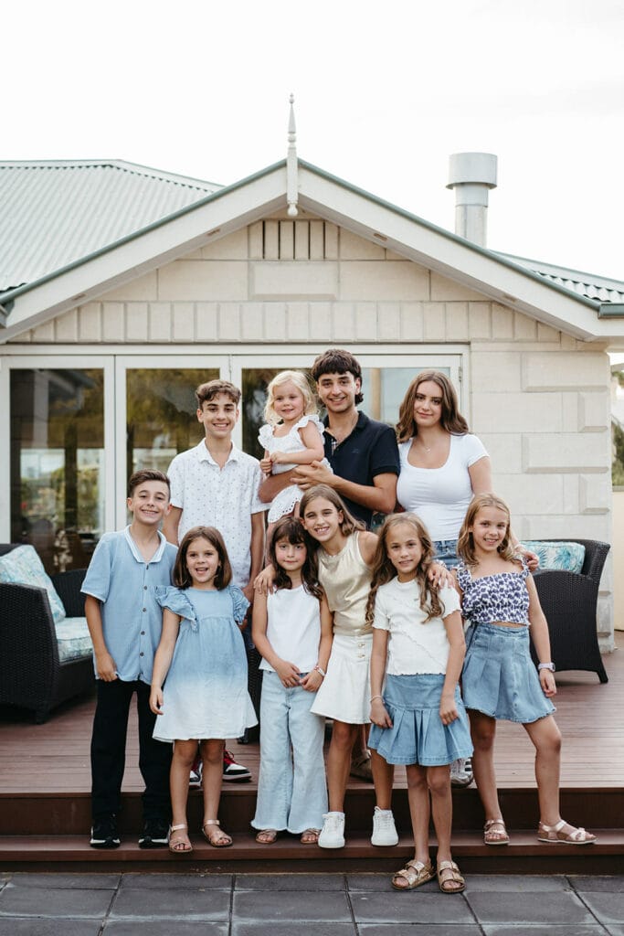 an group photo of an extended family group of cousins