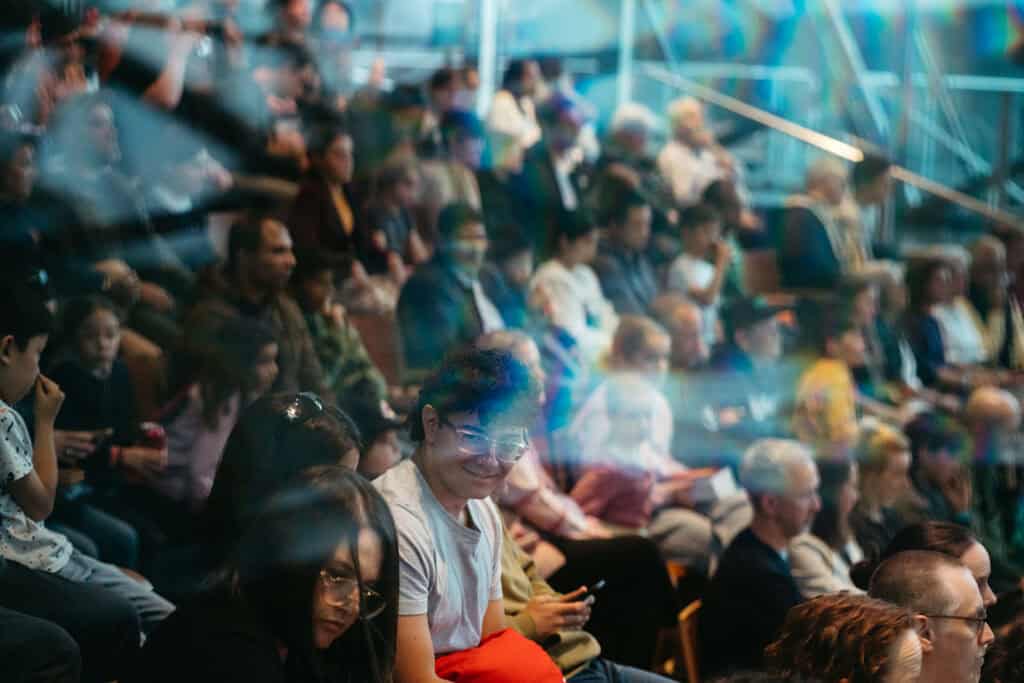 A crowd at a book lanuch at federation square in melbourne