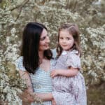 Melbourne mother holds her daughter at a family photo session