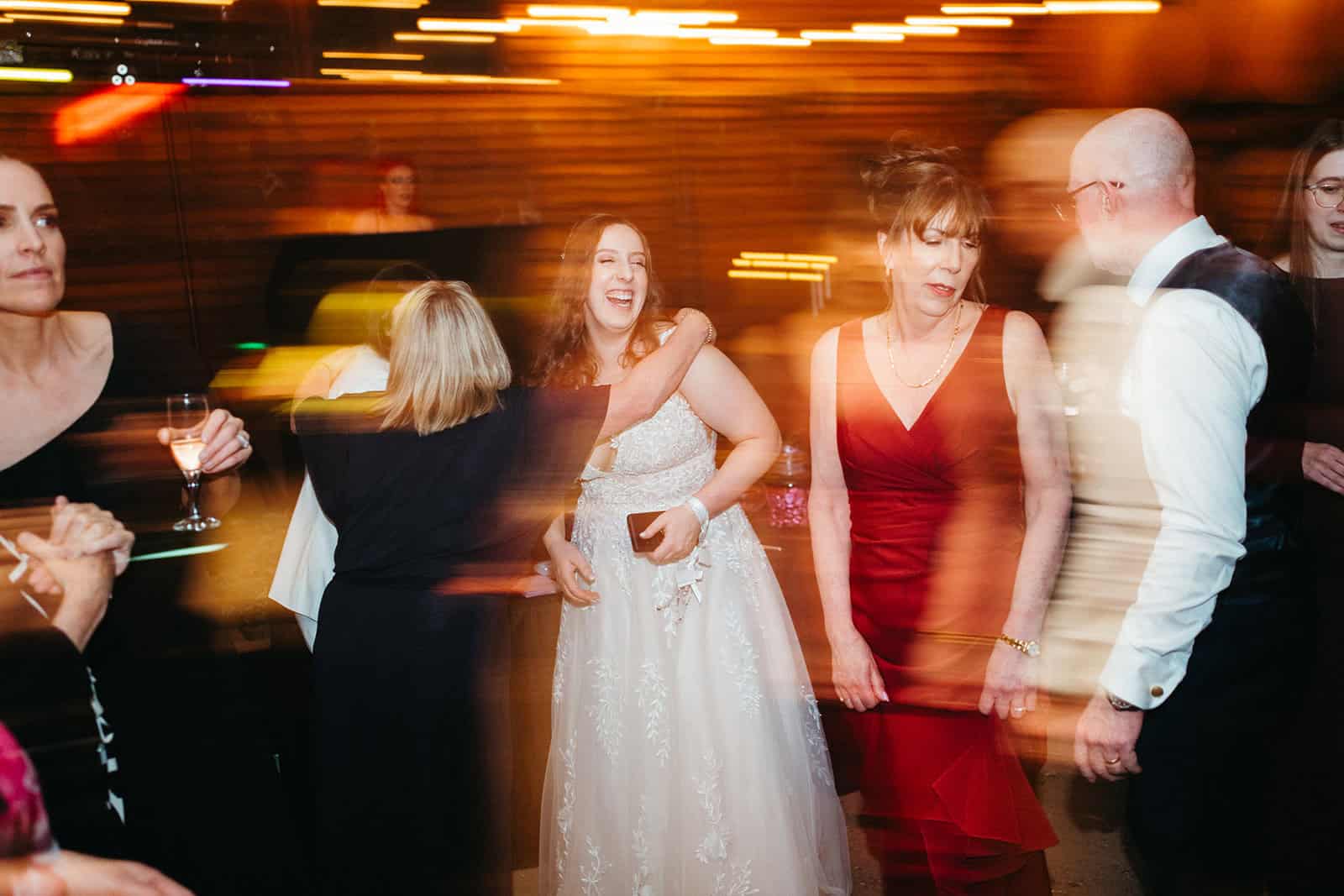 motion blur image of a dance floor at a wedding at alowyn gardens